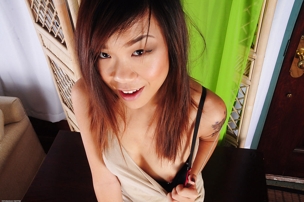 Asian hottie Minnie just cant get enough of that camera attention page 1