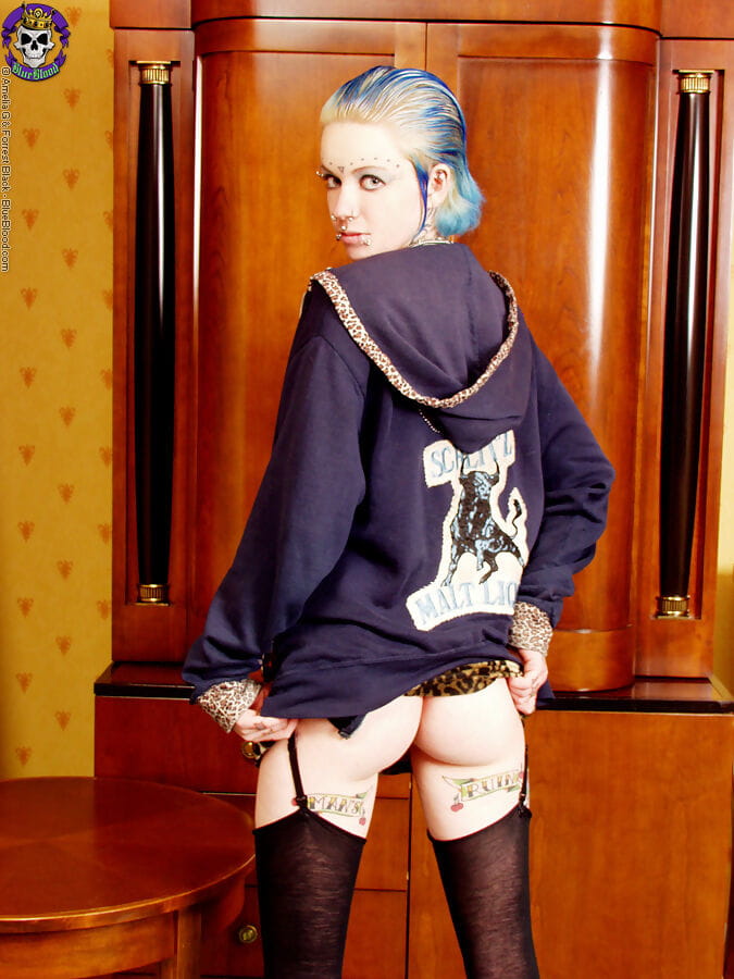 Punk teen Rachel Face shows her well tatted body in black nylons and garters page 1
