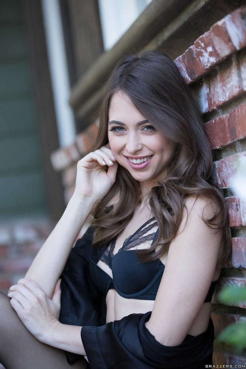 White girl Riley Reid models outdoors in black lingerie with matching hosiery page 1