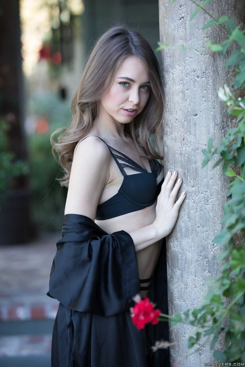 White girl Riley Reid models outdoors in black lingerie with matching hosiery page 1