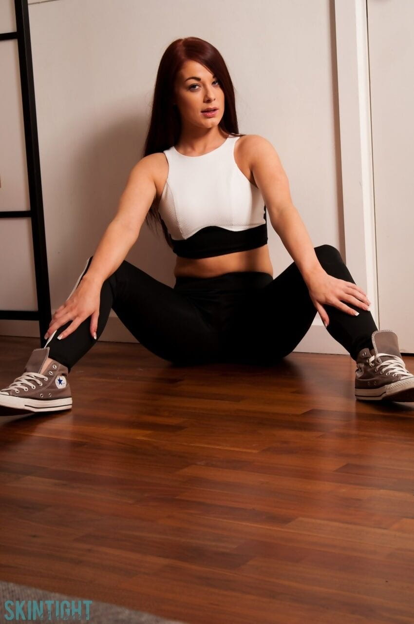 Glamor model Amber Mae slips spandex leggings over her hot ass in sneakers page 1