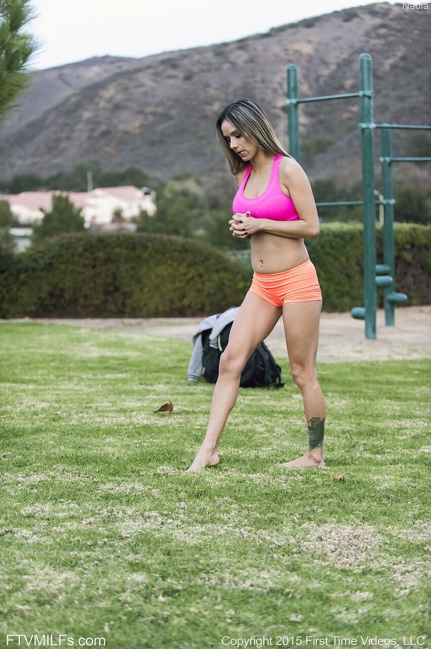 Skinny female Nadia flashes boobs and shaved cherry on golf course page 1