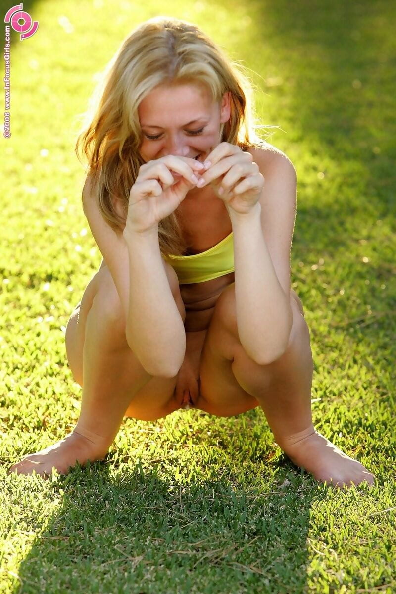 Smiling teen showers morning grass with pee - part 2853 page 1
