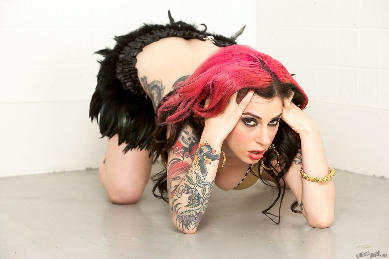 Slutty tattooed MILF Joanna Angel disrobes to spread pussy wearing high heels page 1