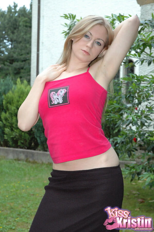 Sporty hot Kristin flashes hot panty upskirt and bares her nipples in the yard page 1