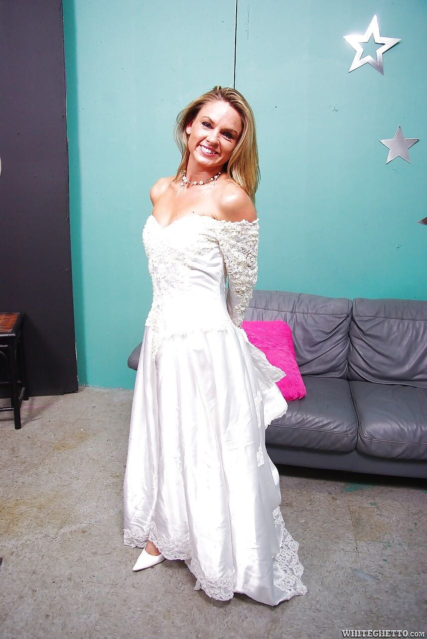 Clothed bride Amanda Blow shedding wedding dress before MMF sex page 1