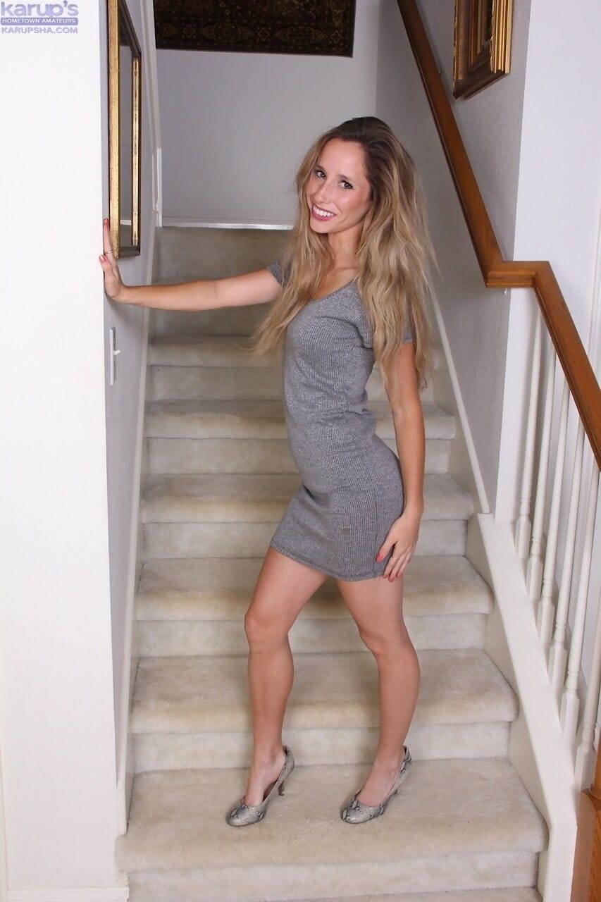 Solo girl Piper Candlewick kicks off her panties for nude poses on stairs page 1