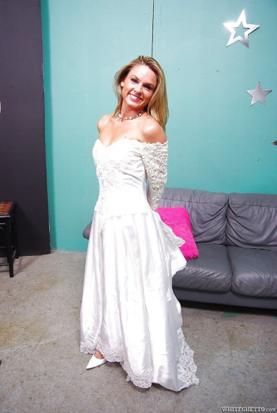 Clothed bride Amanda Blow shedding wedding dress before MMF sex