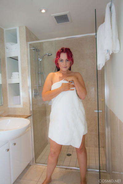 Chubby amateur with dyed hair Chikita Jones wets her big tits during a shower
